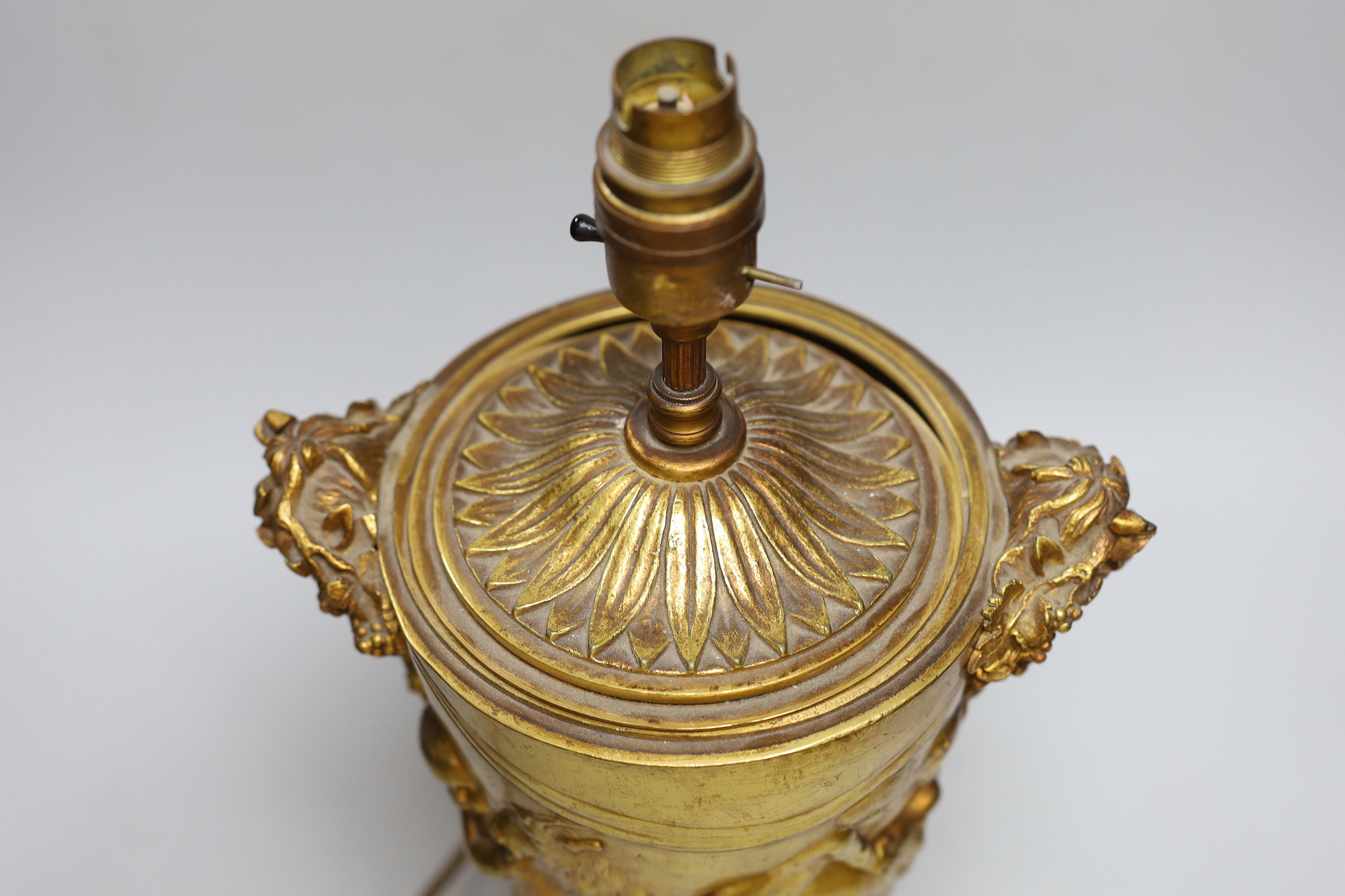 An ormolu urn shaped 'Bacchus' table lamp, 36cm high